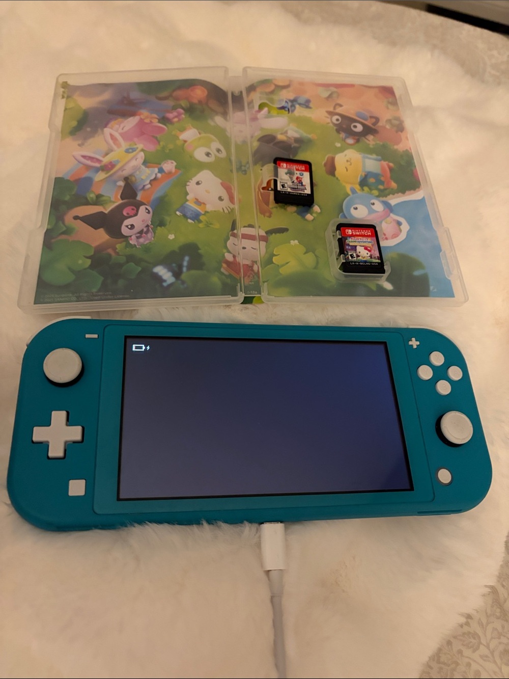 Nintendo Switch Lite Turquoise Handheld Console with 2 games
